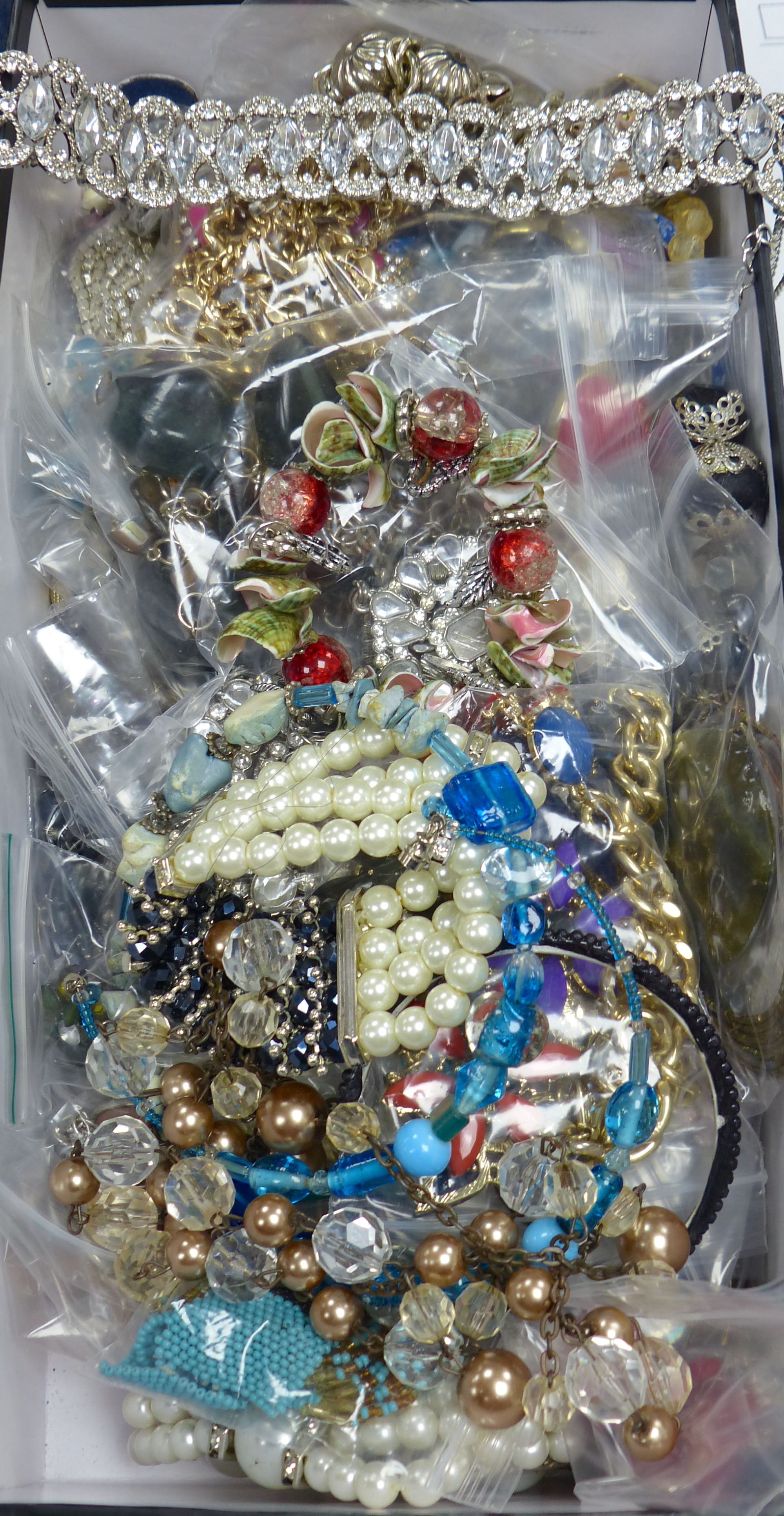 A large quantity of assorted costume jewellery.